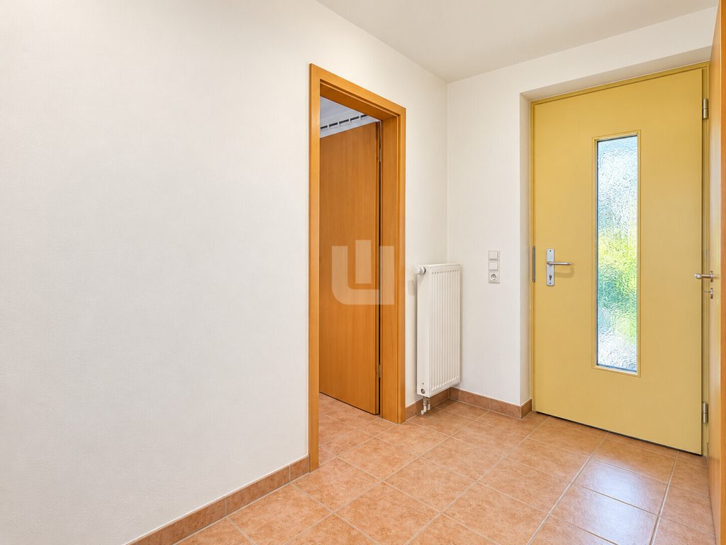 Immobilienangebot - Gröbenzell - Alle - WINDISCH - Zentral und ruhig: Gepflegte Maisonettewohnung mit Garten im Gröbenzeller Familiendorf