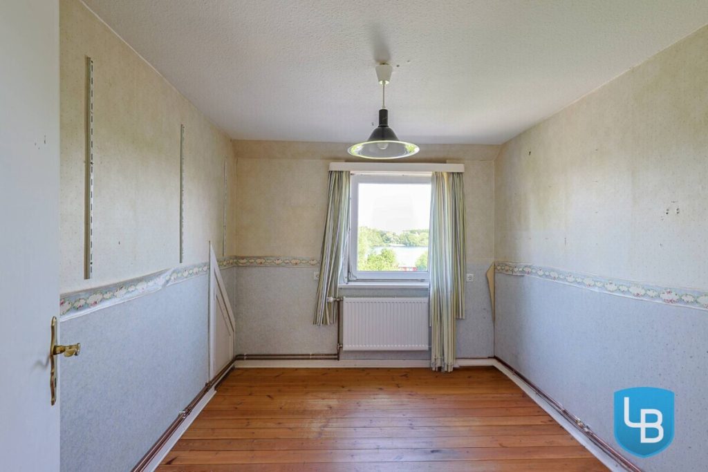 Immobilienangebot - Plön - Alle & Rest (Wohnen) - Doppelhaushälfte auf Seegrundstück mit privatem Steg - Willkommen am Trammer See