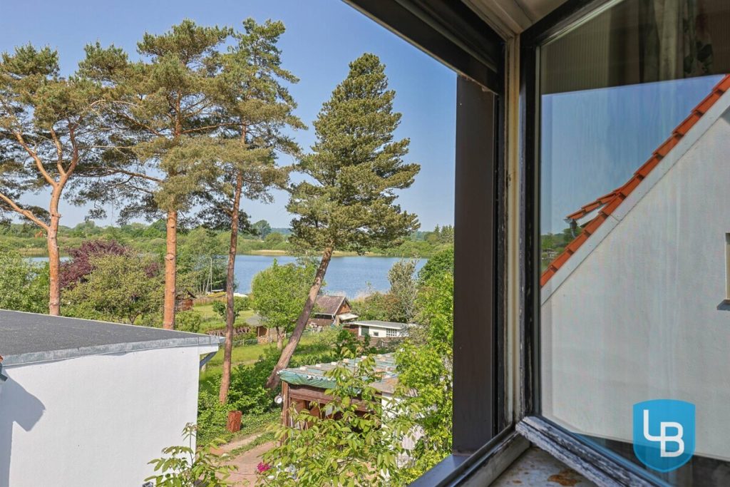 Immobilienangebot - Plön - Alle & Rest (Wohnen) - Doppelhaushälfte auf Seegrundstück mit privatem Steg - Willkommen am Trammer See