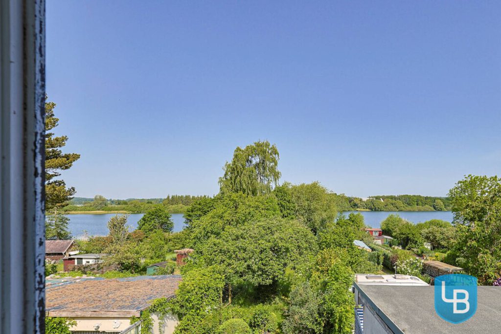 Immobilienangebot - Plön - Alle & Rest (Wohnen) - Doppelhaushälfte auf Seegrundstück mit privatem Steg - Willkommen am Trammer See