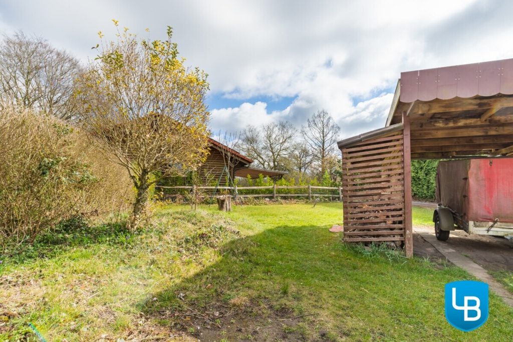 Immobilienangebot - Malente / Kreuzfeld - Alle & Rest (Wohnen) - Sonniges Zuhause mit Perspektive – Teilvermietetes ZFH mit Nebengebäude auf großzügigem Grundstück