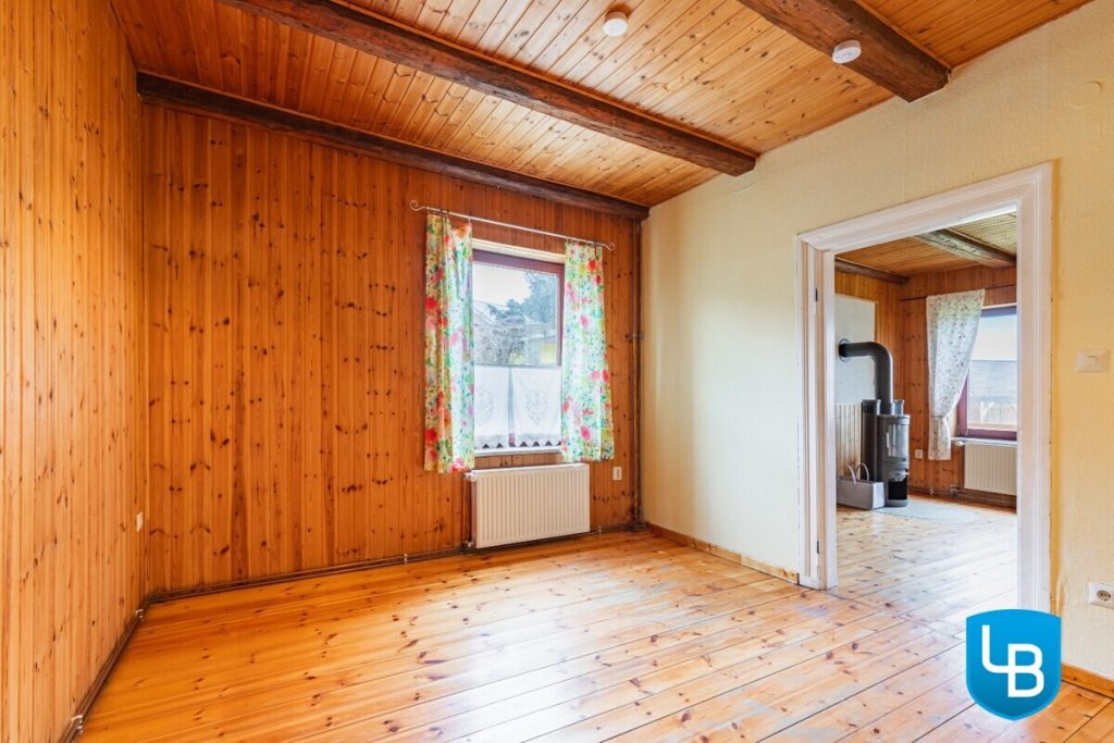 Immobilienangebot - Malente / Kreuzfeld - Alle & Rest (Wohnen) - Sonniges Zuhause mit Perspektive – Teilvermietetes ZFH mit Nebengebäude auf großzügigem Grundstück