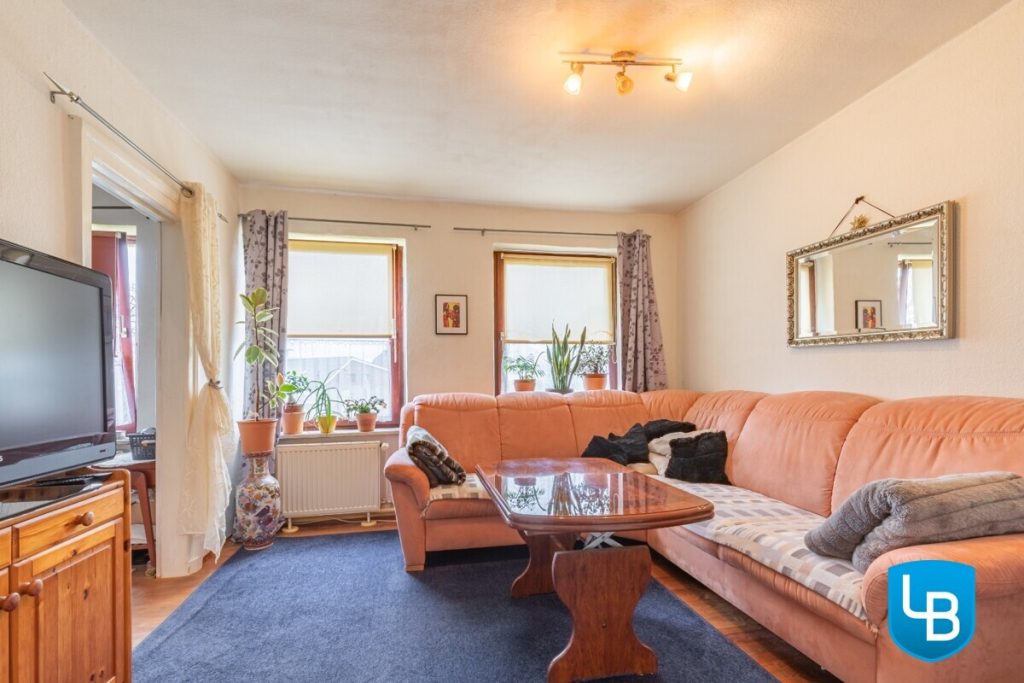 Immobilienangebot - Malente / Kreuzfeld - Alle & Rest (Wohnen) - Sonniges Zuhause mit Perspektive – Teilvermietetes ZFH mit Nebengebäude auf großzügigem Grundstück