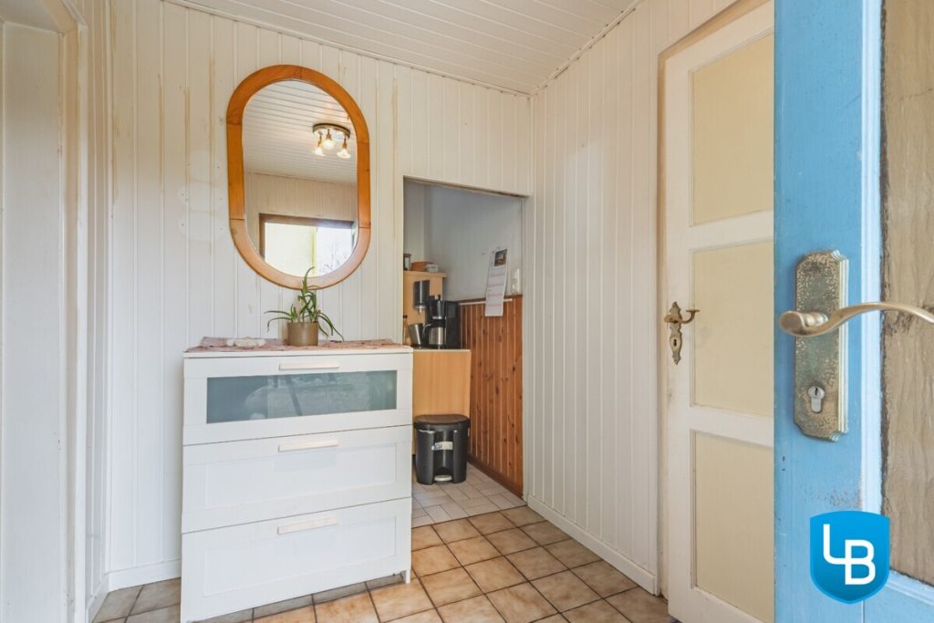 Immobilienangebot - Malente / Kreuzfeld - Alle & Rest (Wohnen) - Sonniges Zuhause mit Perspektive – Teilvermietetes ZFH mit Nebengebäude auf großzügigem Grundstück