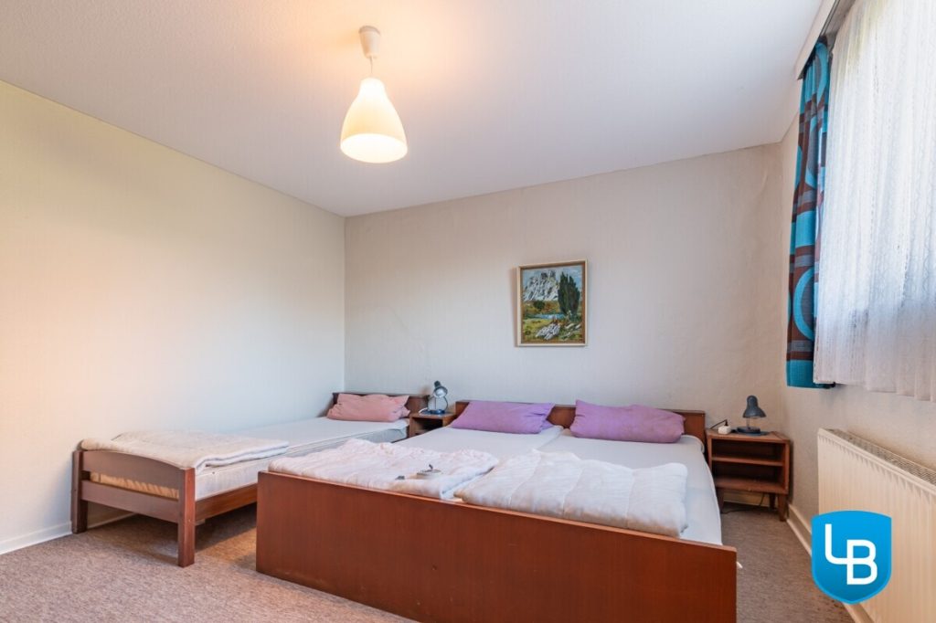 Immobilienangebot - Bösdorf - Alle & Rest (Wohnen) - Vielseitig nutzbares Zweifamilienhaus auf pflegeleichtem Grundstück