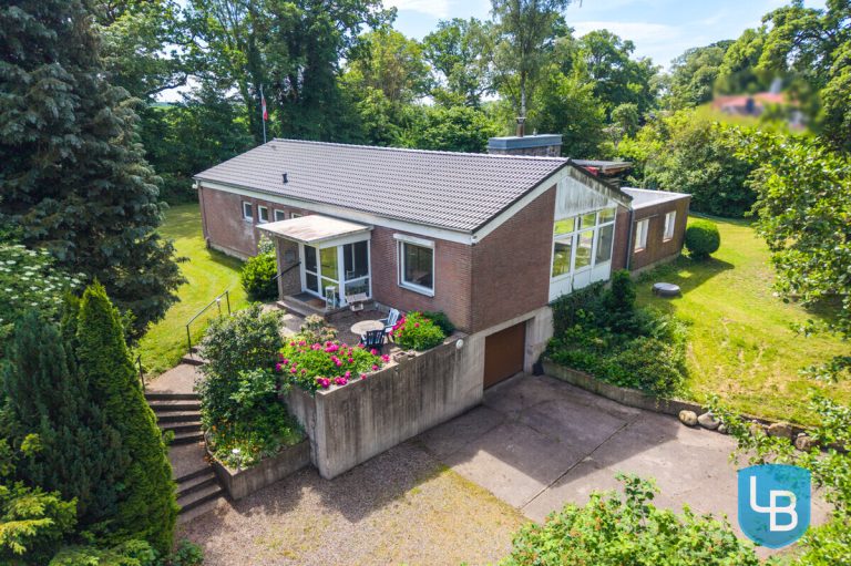 Immobilienangebot - Lensahn - Alle & Rest (Wohnen) - Wohnen auf einer Ebene mit viel Freiraum – Charmantes Einfamilienhaus auf großem Grundstück