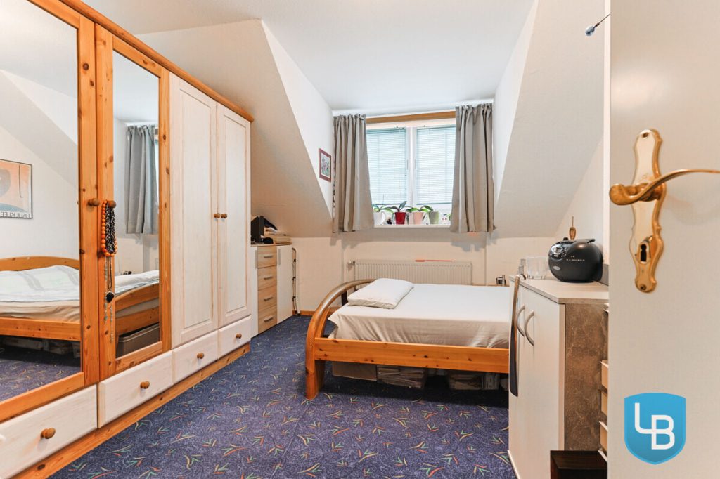 Immobilienangebot - Schellhorn - Alle & Rest (Wohnen) - Kapitalanlage nahe Preetz: Gepflegte Dachgeschosswohnung in einer Doppelhaushälfte
