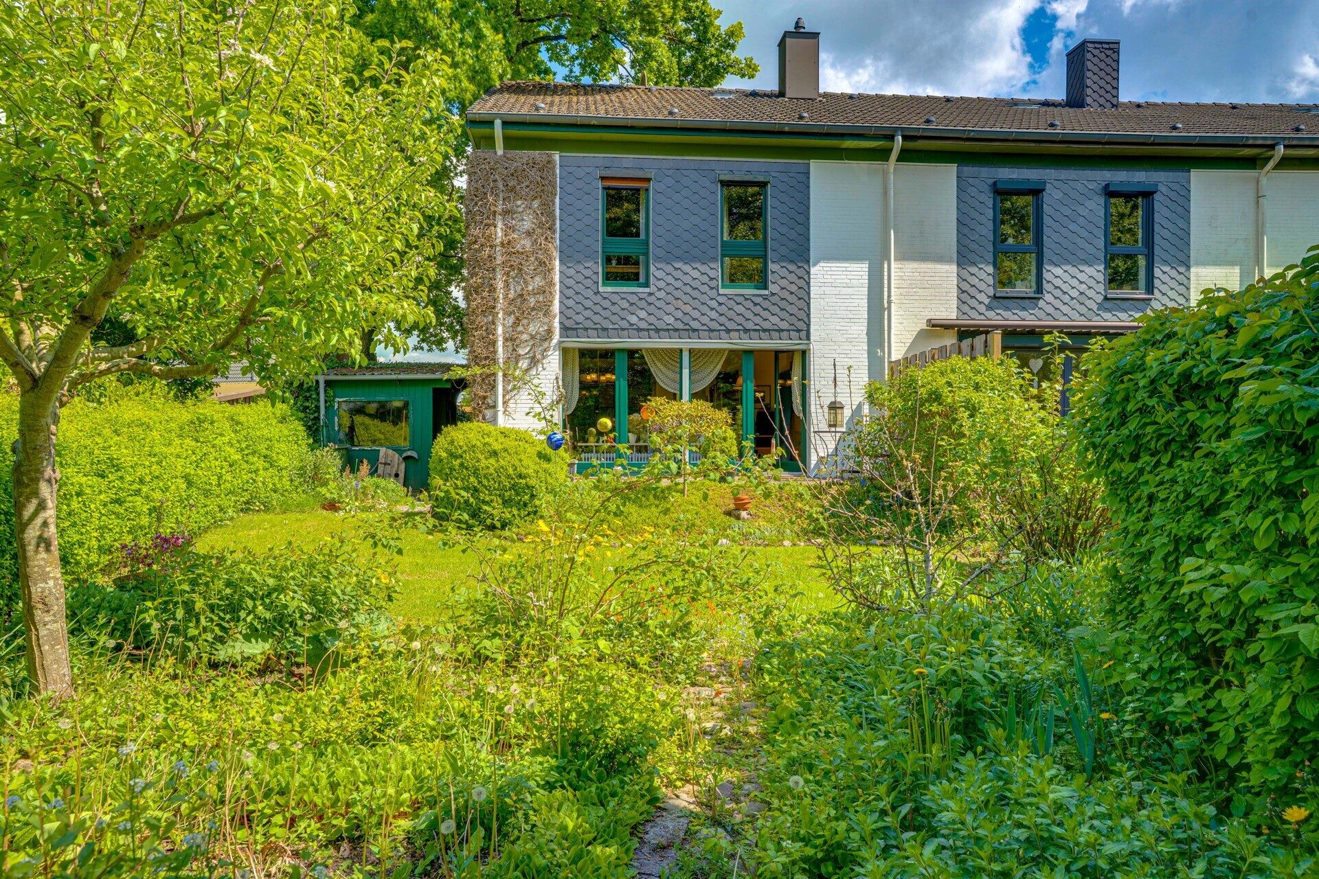 Immobilienangebot - Kropp - Alle - Ruhig gelegenes REH in Kropp mit liebevoll angelegtem Garten, Vollkeller & Gestaltungsmöglichkeiten!