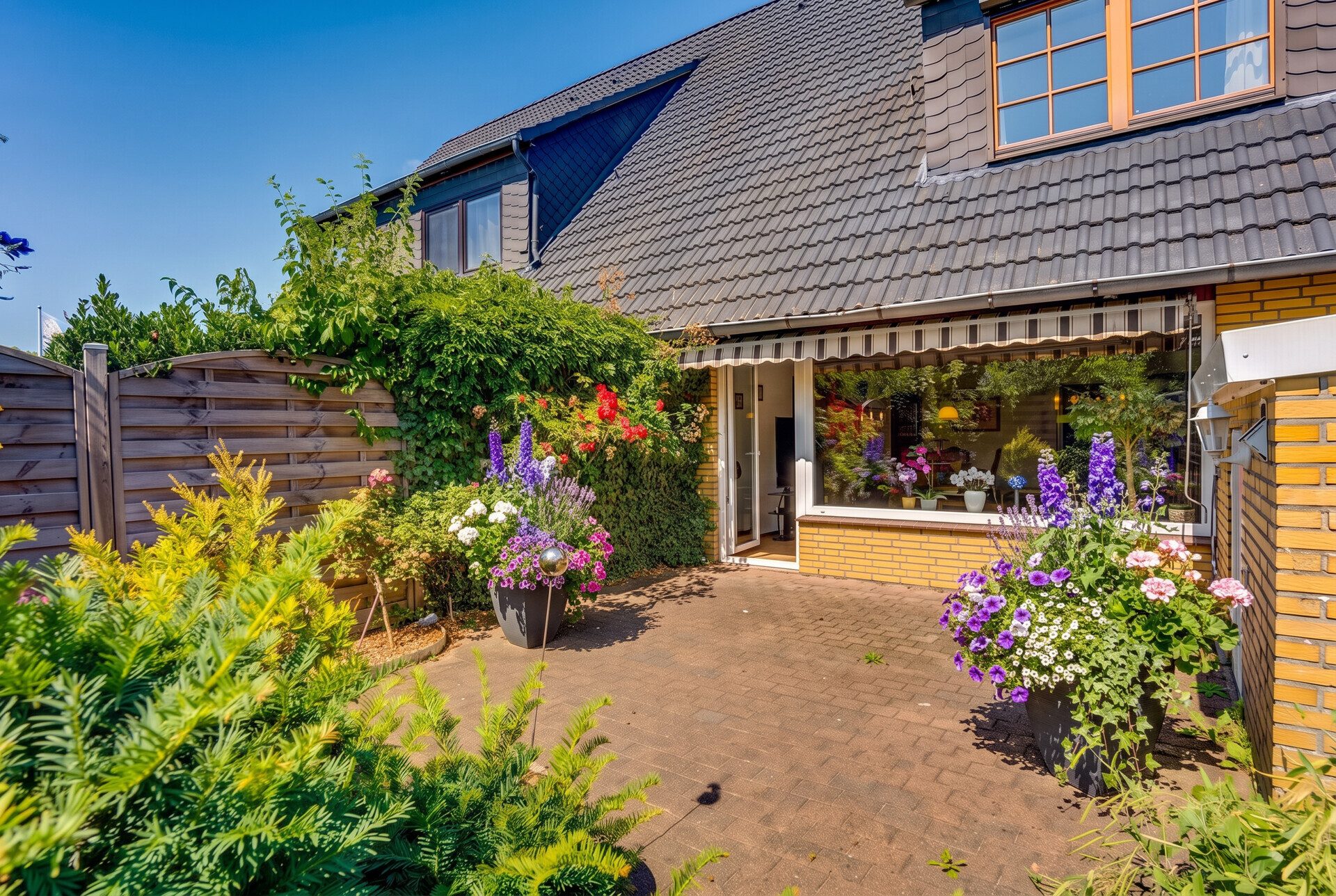 Immobilienangebot - Flensburg - Alle - Gepflegtes Zuhause mit sonniger Terrasse, Stellplatz und praktischer Aufteilung