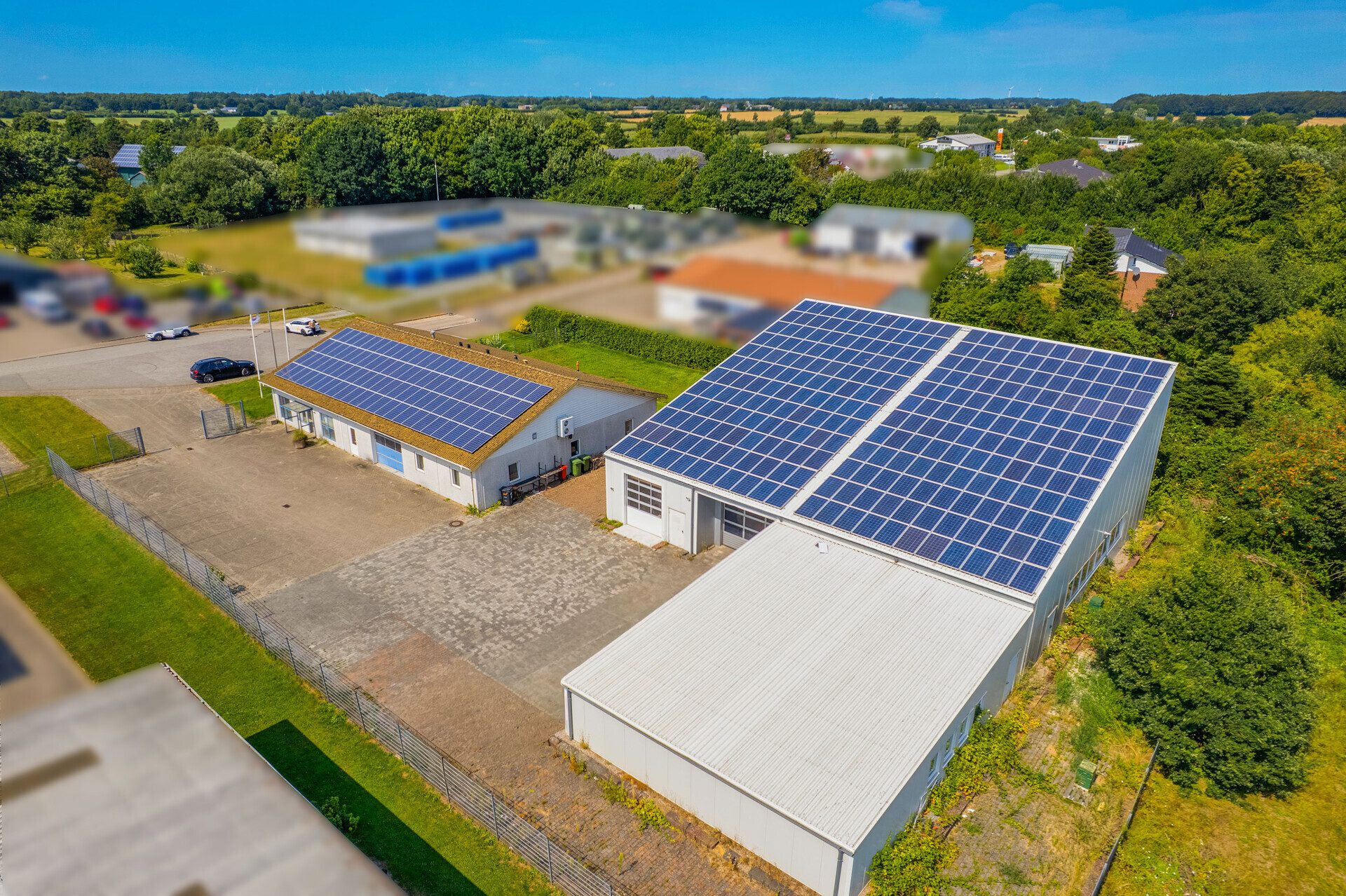 Immobilienangebot - Schleswig - Alle - Große PV-Anlage mit attraktiver Einspeisevergütung – vielseitige Hallen mit Wachstumspotenzial!
