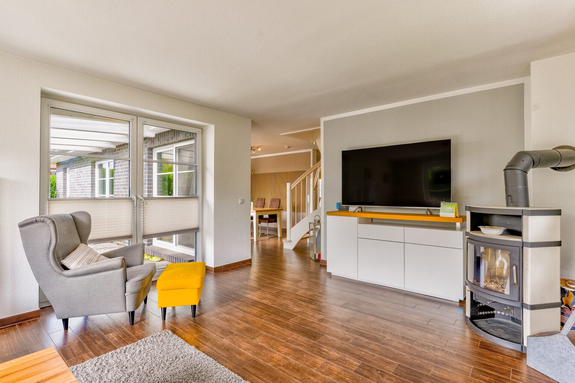 Immobilienangebot - Taarstedt / Scholderup - Alle - Modernes Design trifft Wohnqualität: EFH mit Kamin, Solarthermie, Wallbox & großzügiger Doppelgarage