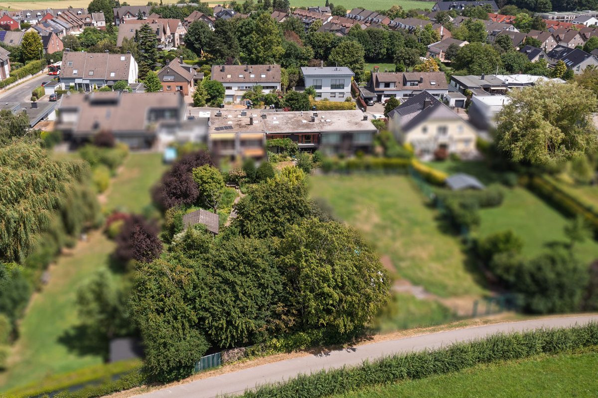 Immobilienangebot - Aachen - Alle - Exklusive Wohlfühloase – Außergewöhnliches Einfamilienhaus mit parkähnlichem Garten