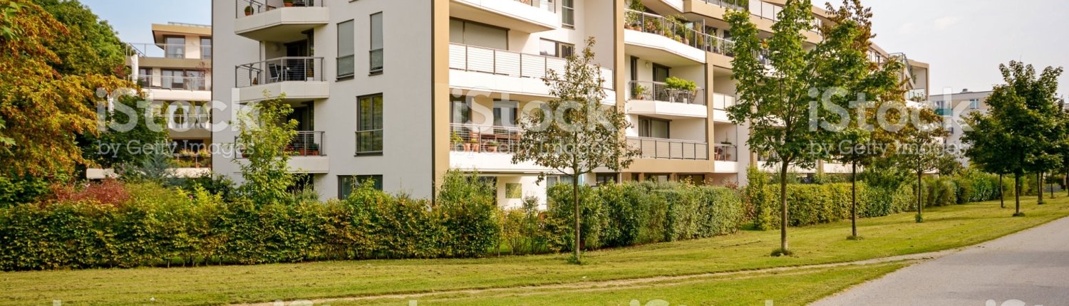Modern green residential building, apartments in a new urban development