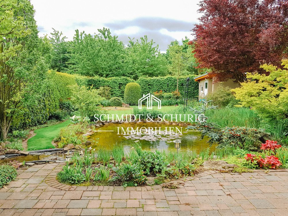 Immobilienangebot - Mörstadt - Alle - Hochwertiges Einfamilienhaus mit Garage und wunderschönen Garten.