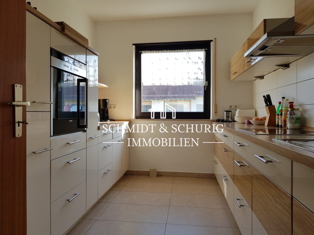 Immobilienangebot - Bruchsal - Alle - Gepflegte 2-Zimmerwohnung mit Balkon, Tiefgarage und Einbauküche.