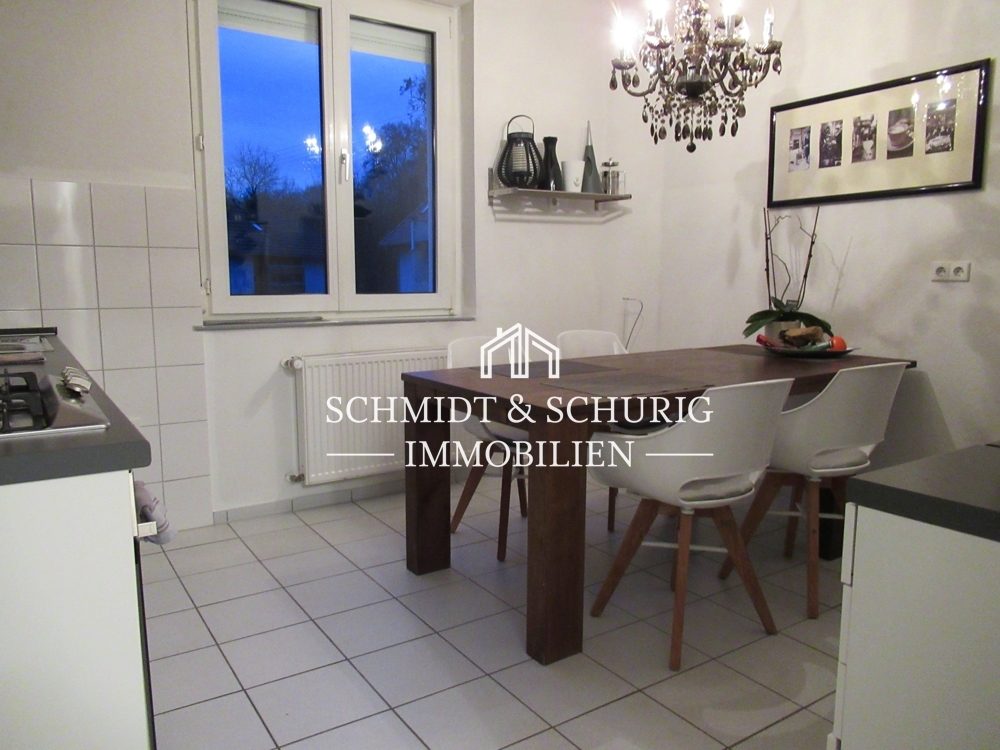 Immobilienangebot - Karlsruhe / Weiherfeld-Dammerstock - Alle - Gepflegte 3-Zimmerwohnung in einem 3-Familienhaus.