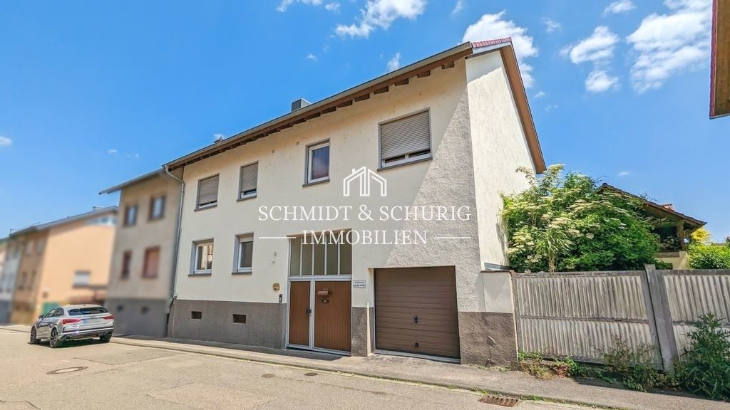 Immobilienangebot - Kraichtal / Unteröwisheim - Alle - Solides Einfamilienhaus mit Garage, Schuppen und Balkon auf 3 Ebenen.