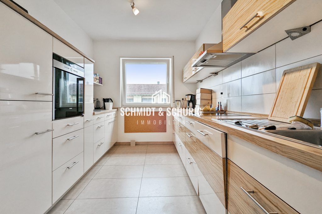 Immobilienangebot - Bruchsal - Alle - Gepflegte 2-Zimmerwohnung mit Balkon, Tiefgarage und Einbauküche.