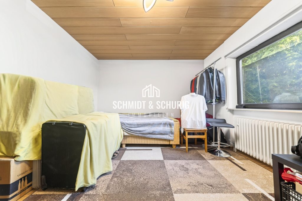 Immobilienangebot - Bretten - Alle - Solides Einfamilienhaus mit Einliegerwohnung und großem Garten