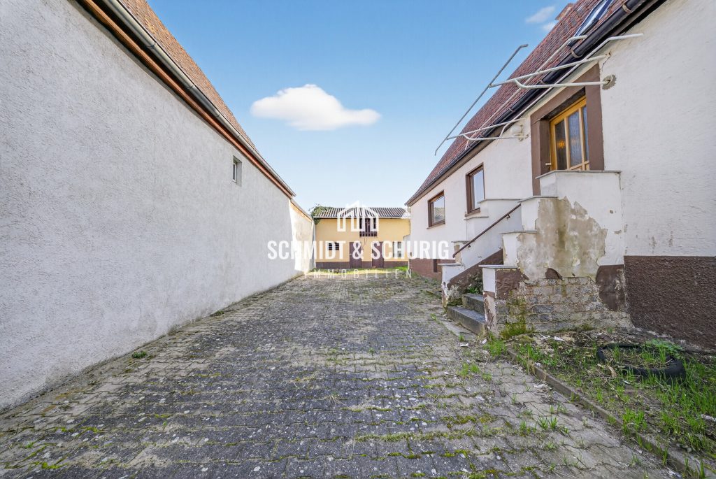 Immobilienangebot - Kronau - Alle - Charmantes Einfamilienhaus mit soliden Gestaltungsmöglichkeiten.