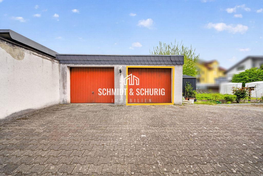 Immobilienangebot - Oberhausen-Rheinhausen - Alle - Charmante Dachgeschosswohnung mit großer Garage und Gartenanteil