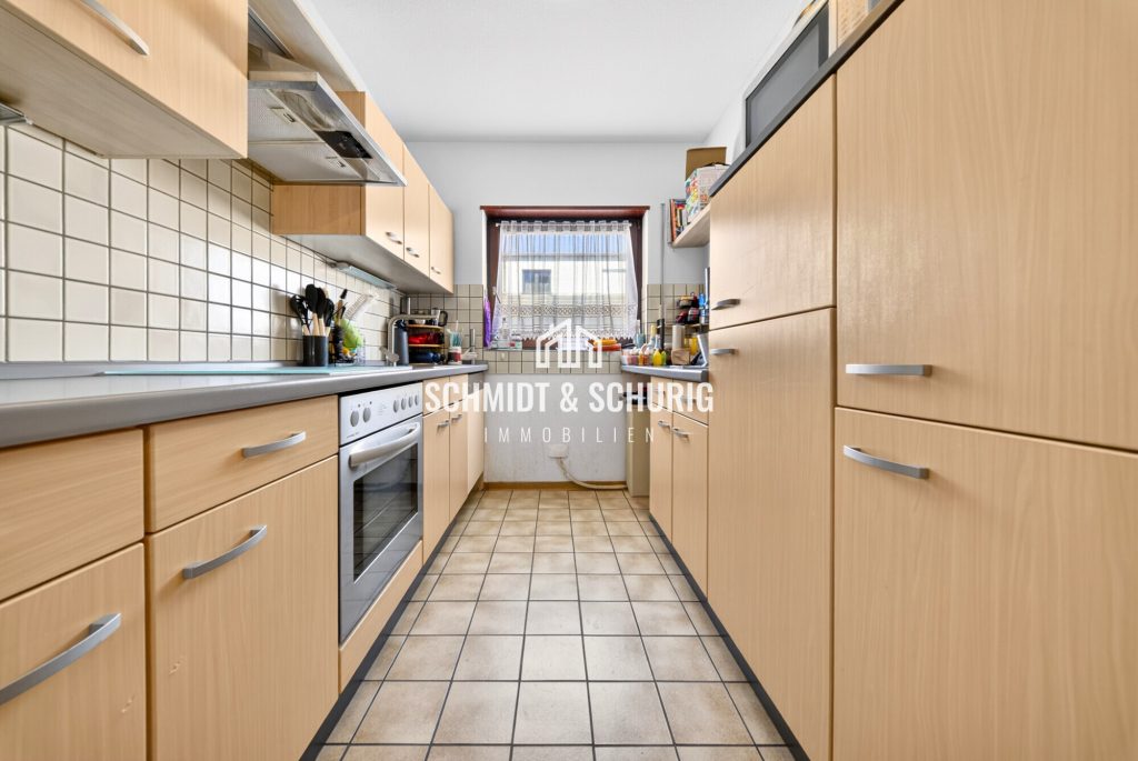 Immobilienangebot - Forst - Alle - Freundliche Etagenwohnung mit Balkon, Garage und solider Mieteinnahme