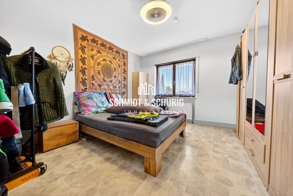 Immobilienangebot - Forst - Alle - Freundliche Etagenwohnung mit Balkon, Garage und solider Mieteinnahme