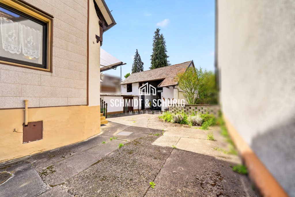 Immobilienangebot - Bruchsal / Untergrombach - Alle - Charmantes Einfamilienhaus mit Ausbaupotenzial und großem Grundstück