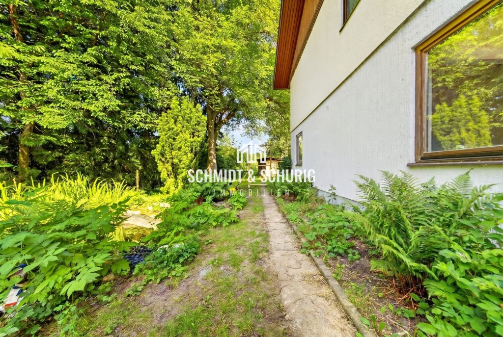 Immobilienangebot - Ölbronn-Dürrn / Ölbronn - Alle - Freistehendes Einfamilienhaus mit Südterrasse, Carport und Garten mit Teich