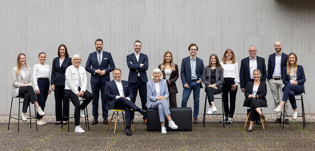 menschen_bei_gisinger_immobilienmakler_team