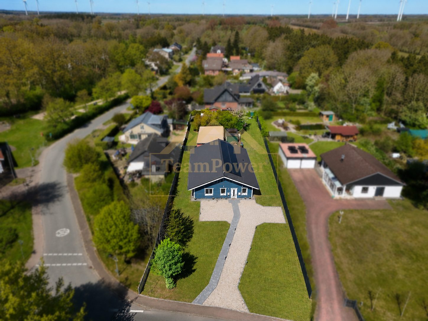 TeamPower Immobilien GmbH - Immobilienangebot - Hasenkrug - Alle - Zeitgemäß wohnen: Nachhaltigkeit im Talis Holzhaus erleben