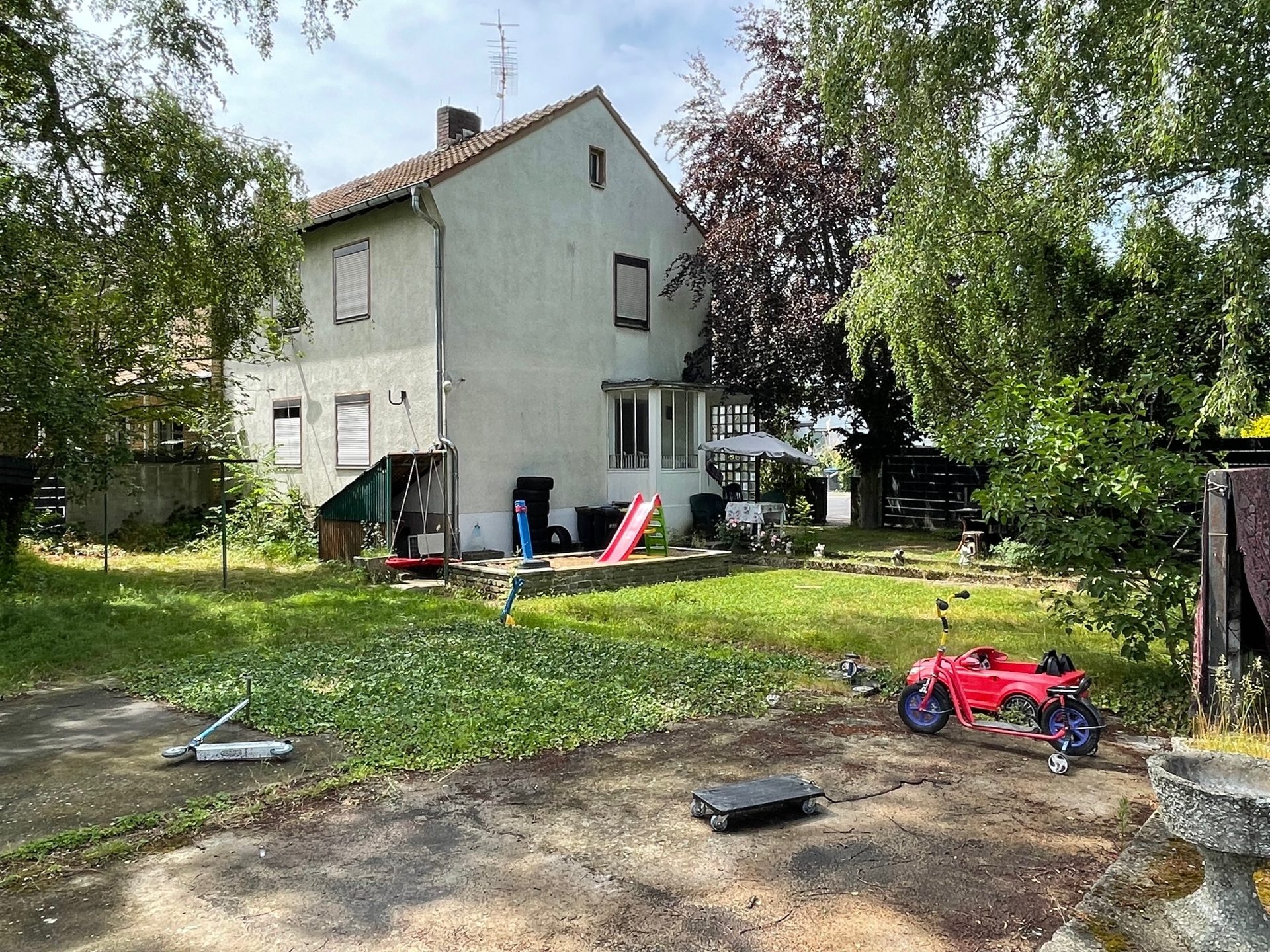 Immobilienangebot - Köln / Dünnwald - Grundstück - Attraktives Baugrundstück mit genehmigter Planung für ein 4-Familienhaus