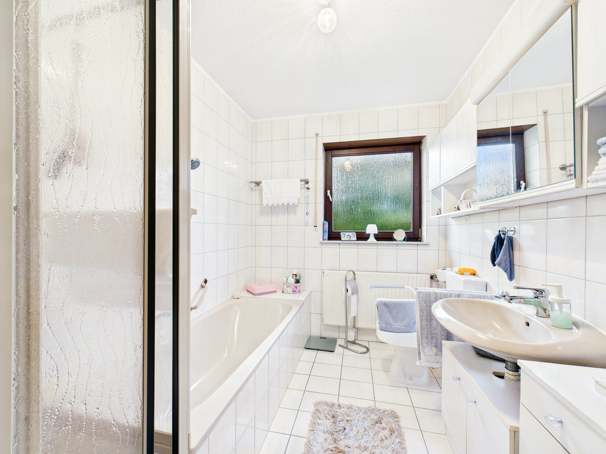 Immobilienangebot - Künzell - Alle - Ruhige 2,5-Zimmer-Wohnung mit Balkon und Garage