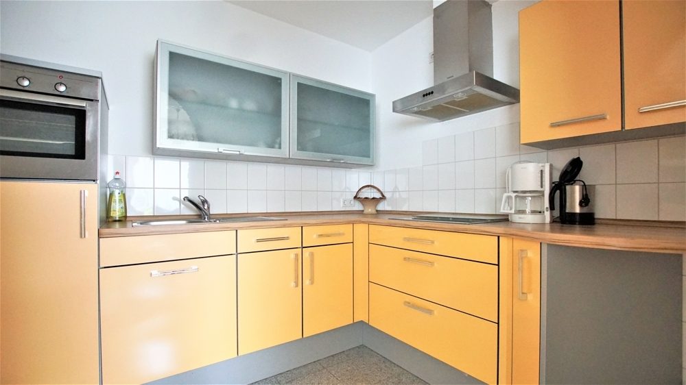 Immobilienangebot - Düsseldorf - Alle - Eller: großzügige 2 Zimmerwohnung mit Loggia, EBK und TG-Stellplatz in zentraler Lage