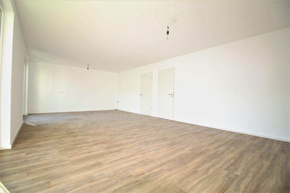 Immobilienangebot - Düsseldorf / Eller - Alle - NEUBAU: Repräsentative und lichtdurchflutete 3-Zimmer Wohnung mit Balkon in beliebter Lage!
