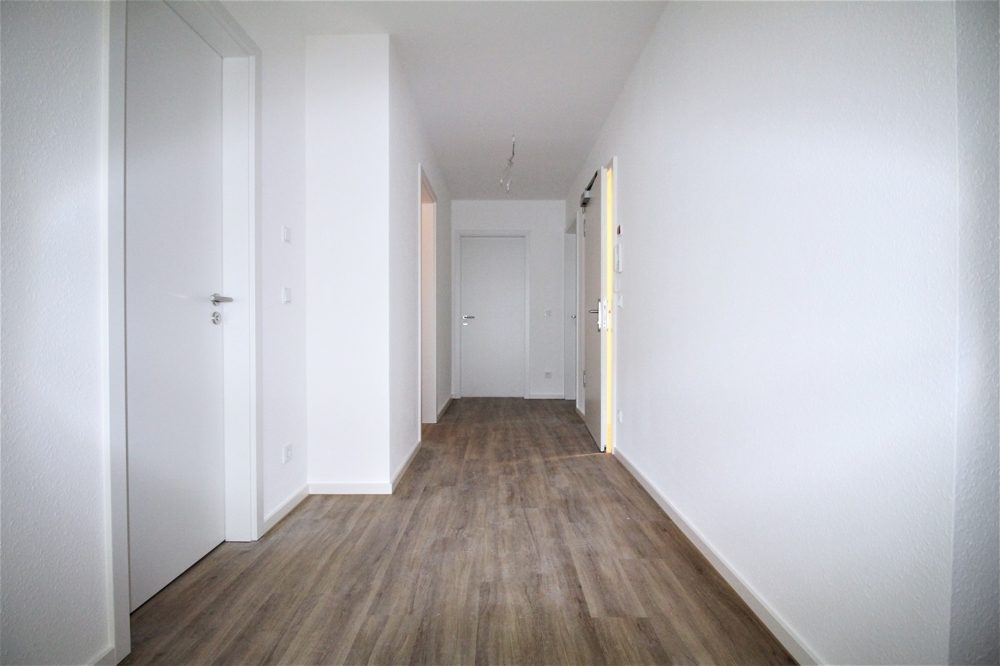 Immobilienangebot - Düsseldorf / Eller - Alle - NEUBAU: Repräsentative und lichtdurchflutete 3-Zimmer Wohnung mit Balkon in beliebter Lage!