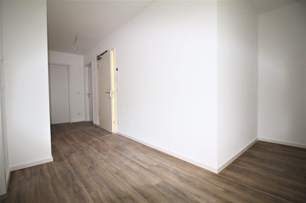 Immobilienangebot - Düsseldorf / Eller - Alle - NEUBAU: Repräsentative und lichtdurchflutete 3-Zimmer Wohnung mit Balkon in beliebter Lage!