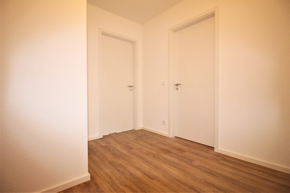 Immobilienangebot - Düsseldorf / Eller - Alle - NEUBAU: Repräsentative und lichtdurchflutete 3-Zimmer Wohnung mit Balkon in beliebter Lage!