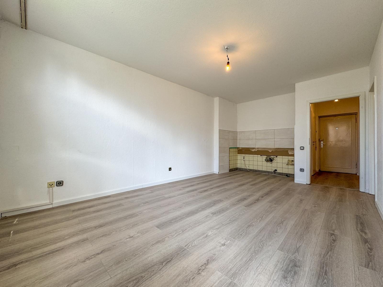 Immobilienangebot - Düsseldorf / Holthausen - Alle - Holthausen: Charmante 2-Zimmer-Wohnung mit offener Wohnküche und ruhigem Balkon