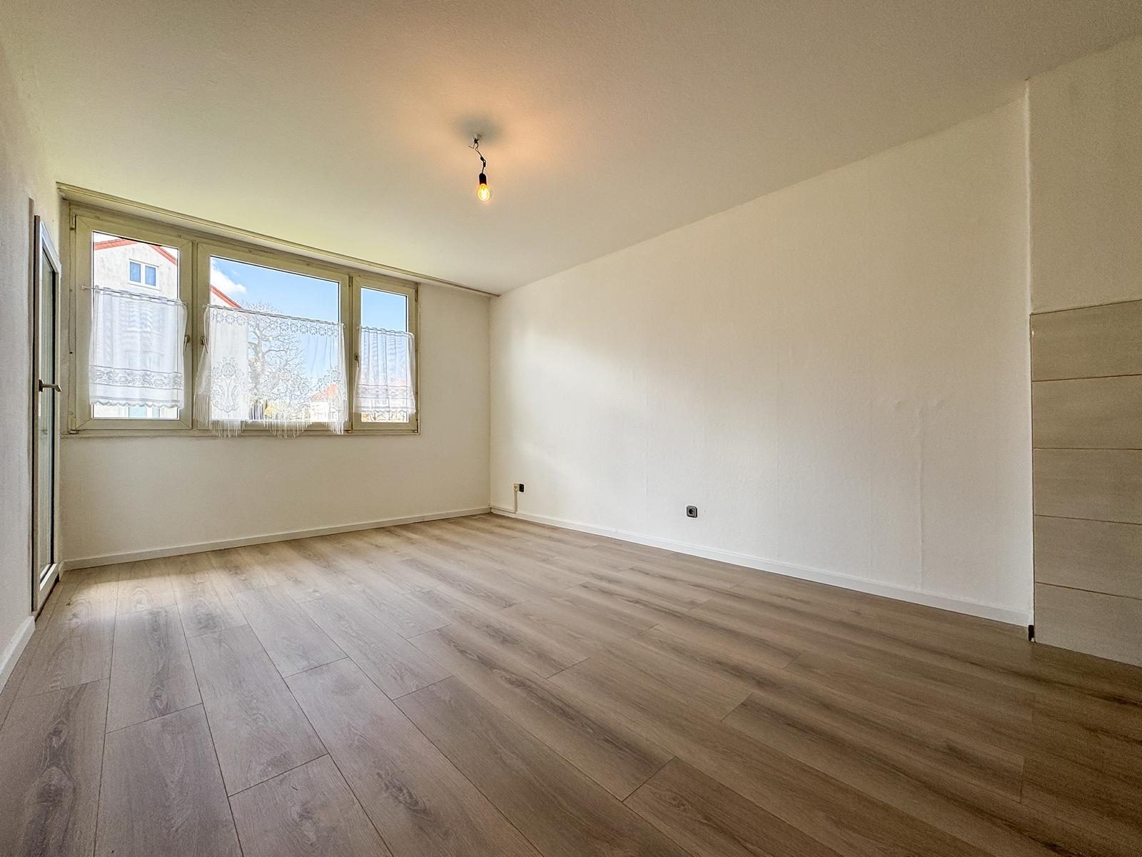 Immobilienangebot - Düsseldorf / Holthausen - Alle - Holthausen: Charmante 2-Zimmer-Wohnung mit offener Wohnküche und ruhigem Balkon