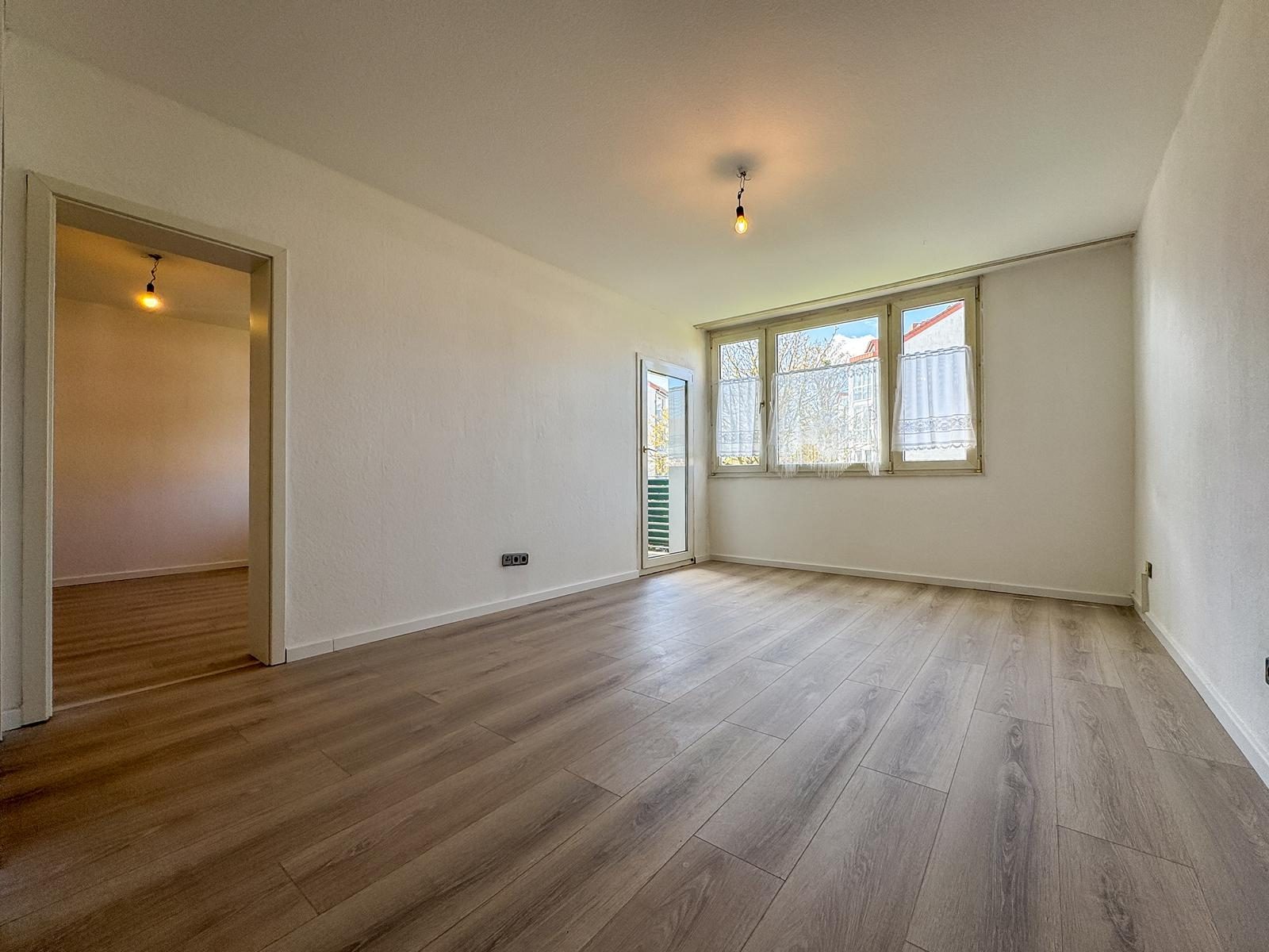 Immobilienangebot - Düsseldorf / Holthausen - Alle - Holthausen: Charmante 2-Zimmer-Wohnung mit offener Wohnküche und ruhigem Balkon