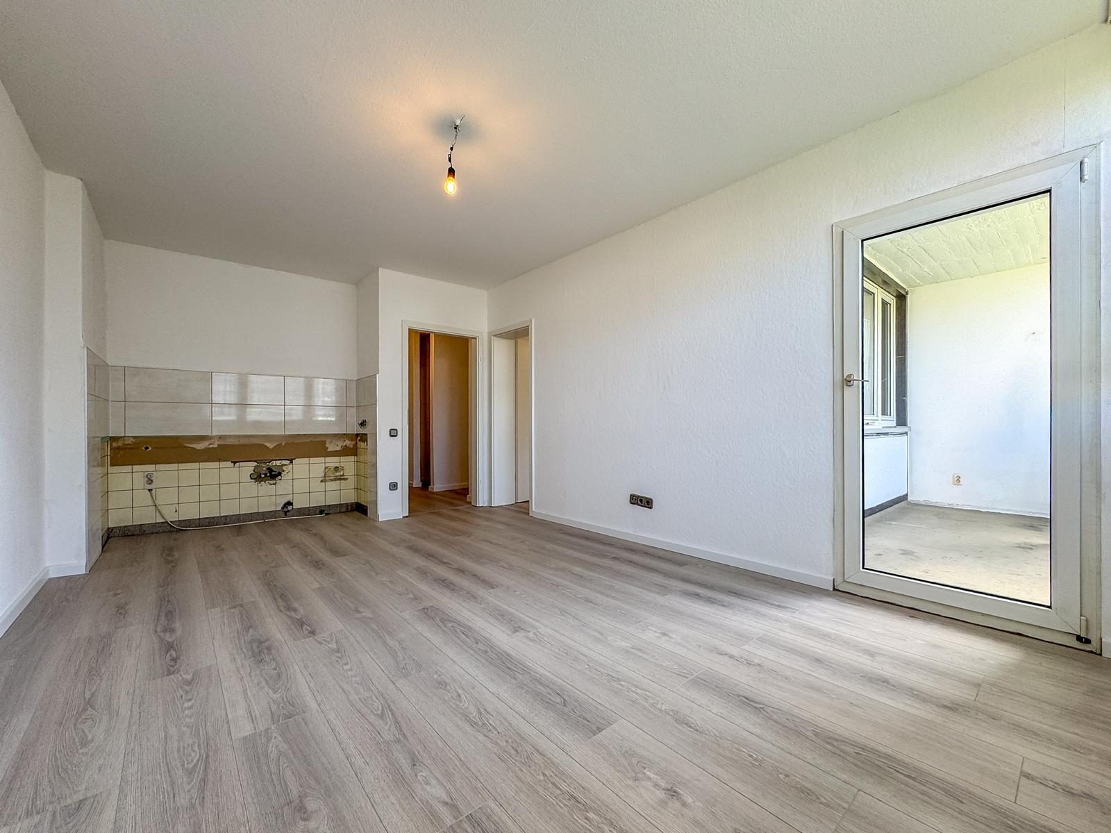 Immobilienangebot - Düsseldorf / Holthausen - Alle - Holthausen: Charmante 2-Zimmer-Wohnung mit offener Wohnküche und ruhigem Balkon