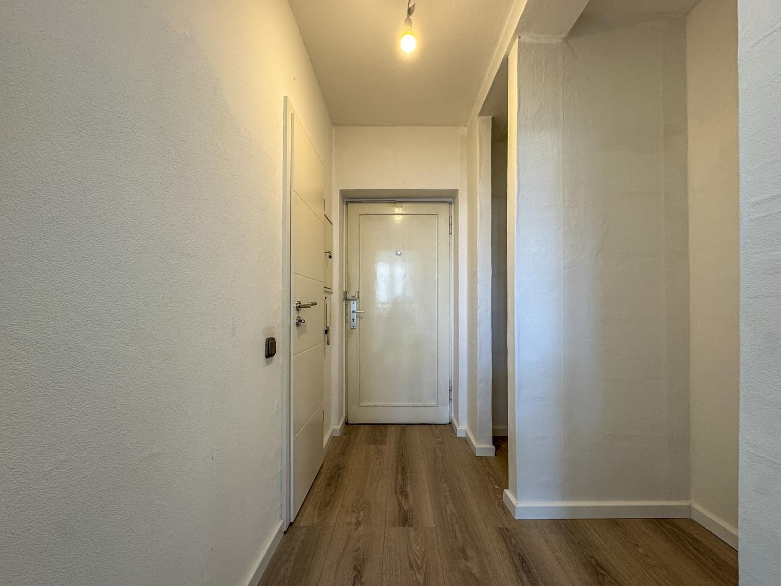Immobilienangebot - Düsseldorf / Holthausen - Alle - Holthausen: Charmante 2-Zimmer-Wohnung mit offener Wohnküche und ruhigem Balkon