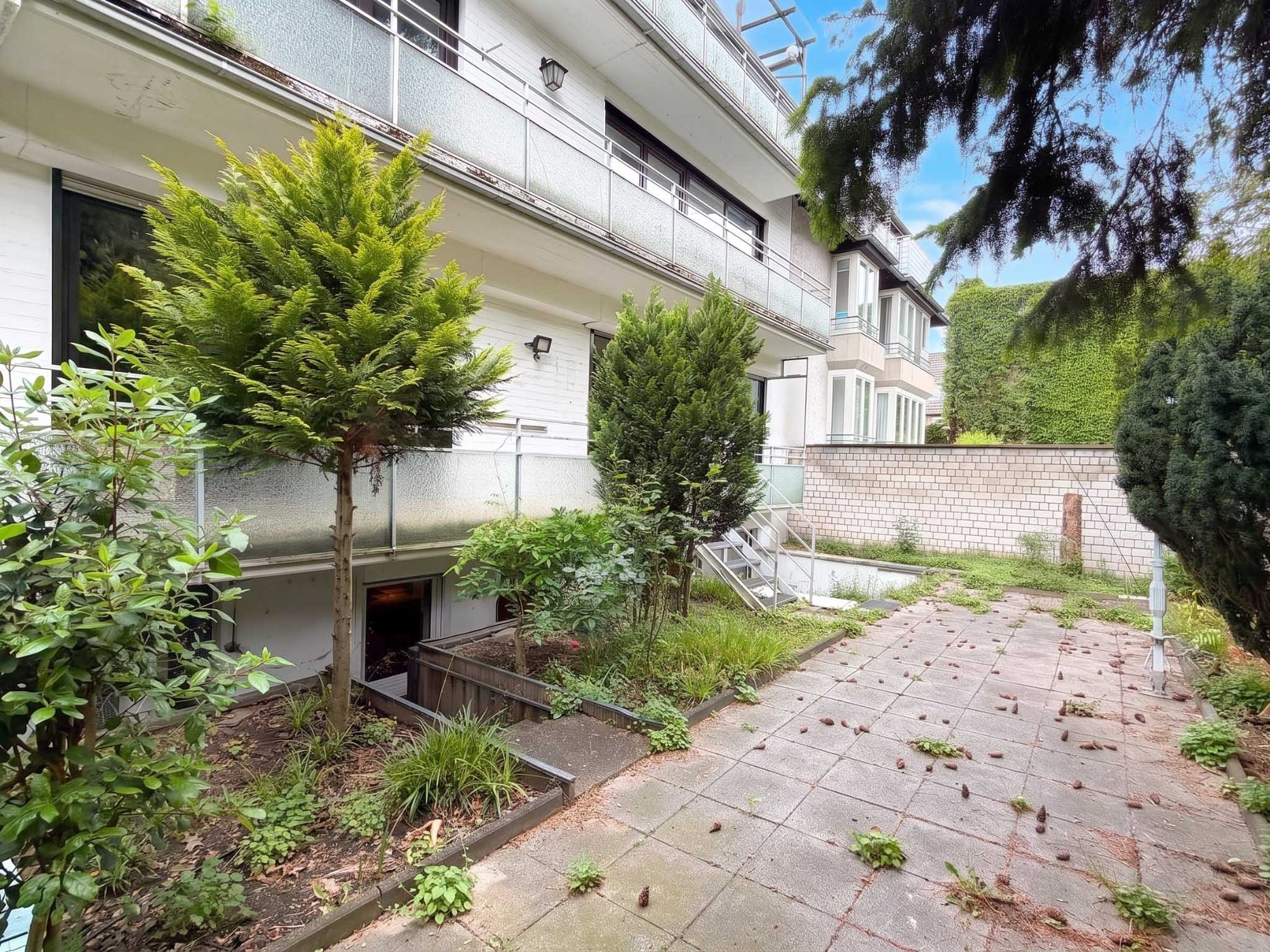 Immobilienangebot - Düsseldorf - Alle - Düsseldorf-Rath: Maisonette mit Hauscharakter, Garten und separat vermietetem Appartement!