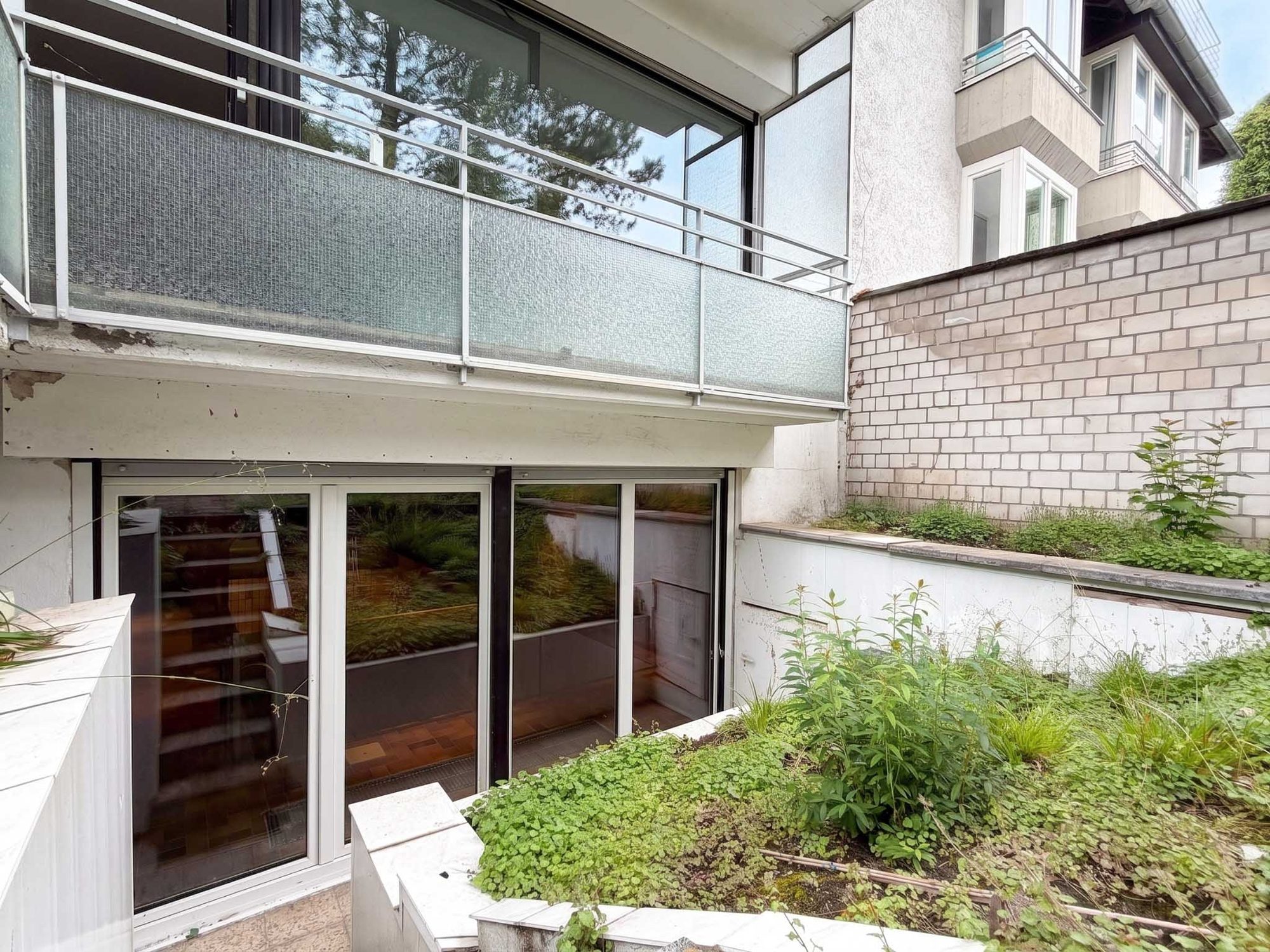 Immobilienangebot - Düsseldorf - Alle - Düsseldorf-Rath: Maisonette mit Hauscharakter, Garten und separat vermietetem Appartement!