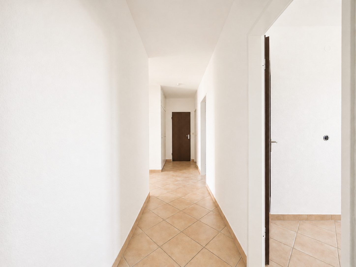 Immobilienangebot - Düsseldorf - Alle - Blick ins Grüne: familienfreundliche 4-Zimmerwohnung mit Südbalkon und Garage in Unterbach