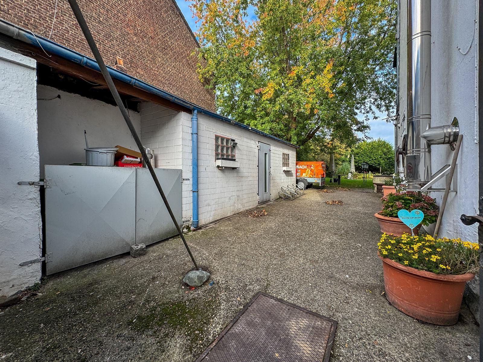 Immobilienangebot - Jüchen - Alle - Jüchen-Hochneukirch: Wohn- und Geschäftshaus mit Entwicklungspotenzial auf großzügigem Grundstück