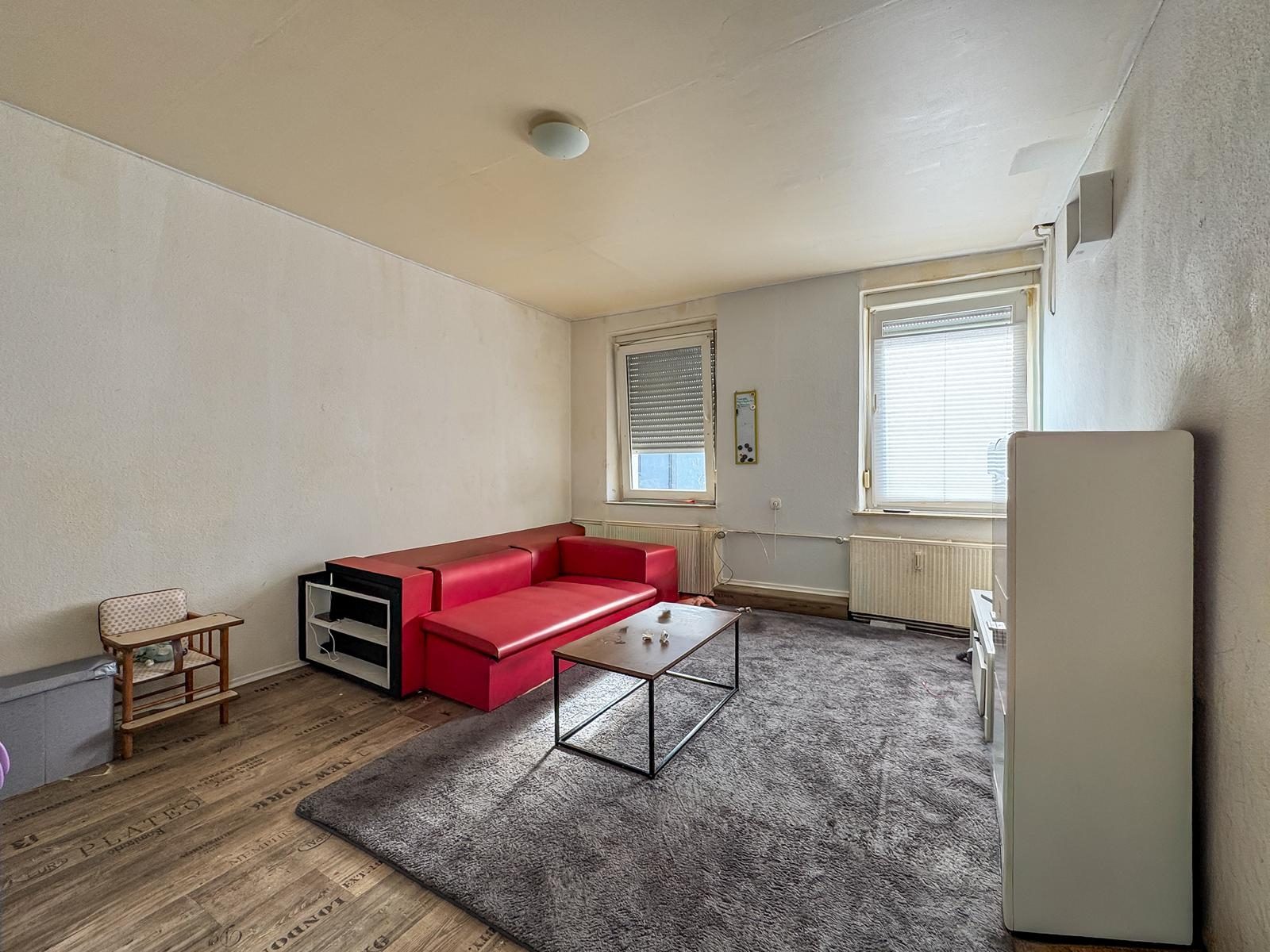 Immobilienangebot - Jüchen - Alle - Jüchen-Hochneukirch: Wohn- und Geschäftshaus mit Entwicklungspotenzial auf großzügigem Grundstück