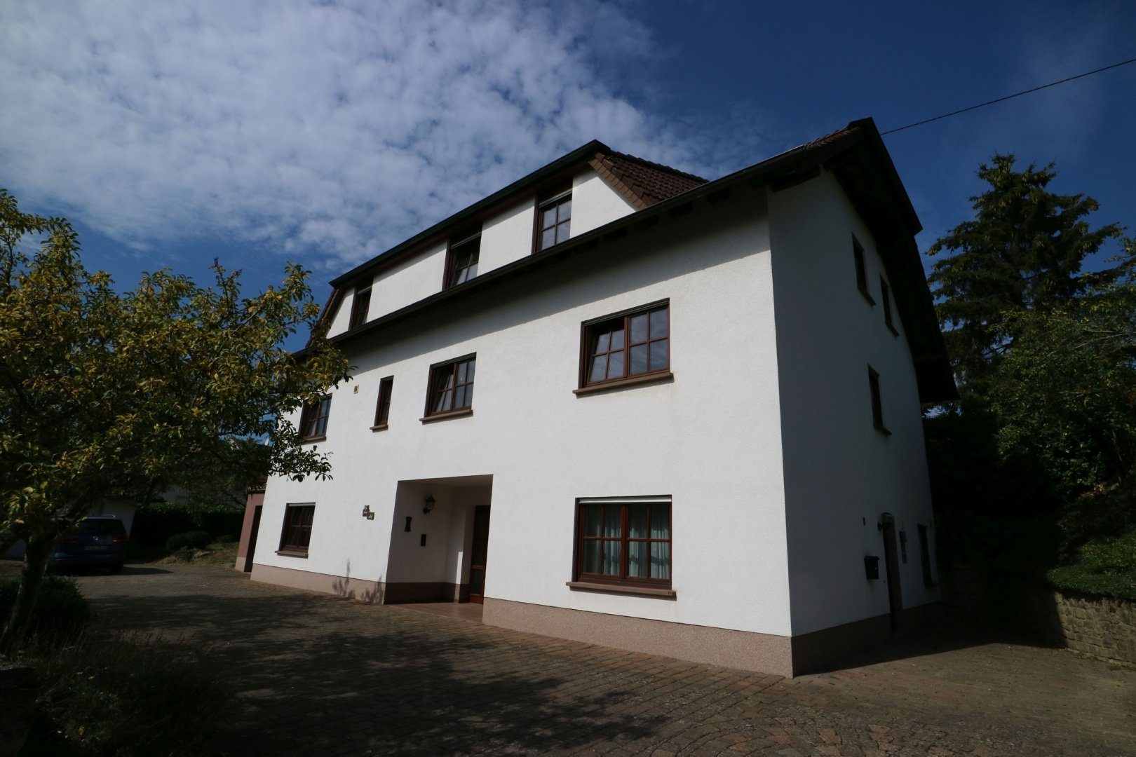 Volksbank Trier Eifel Immobilien GmbH - Immobilienangebot - Wincheringen - Einfamilienhaus mit Einliegerwohnung - Raumwunder mit grünen Aussichten