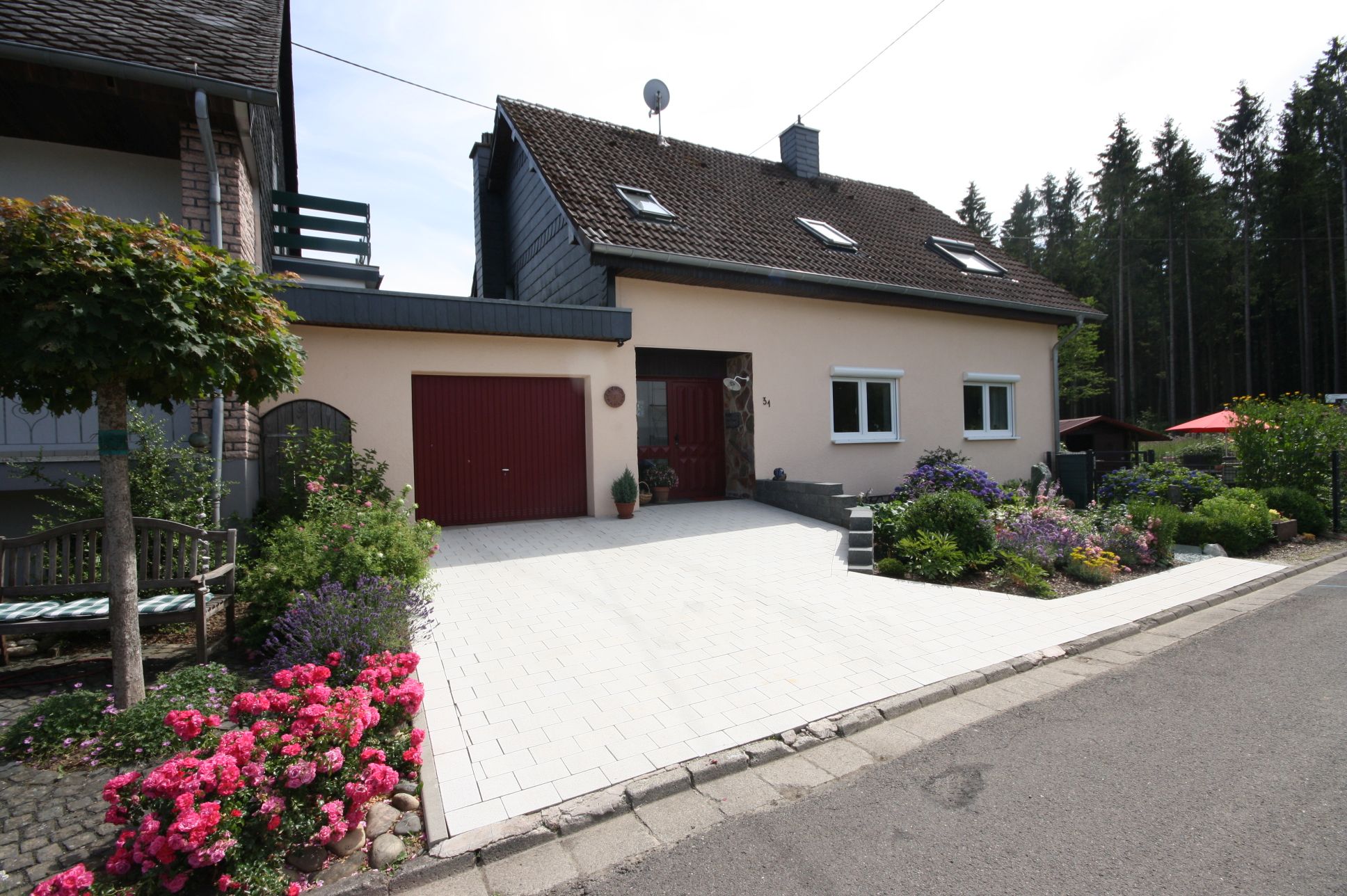 Volksbank Trier Eifel Immobilien GmbH - Immobilienangebot - Malborn - Einfamilienhaus - Hier wartet Wohnglück - drinnen wie draußen